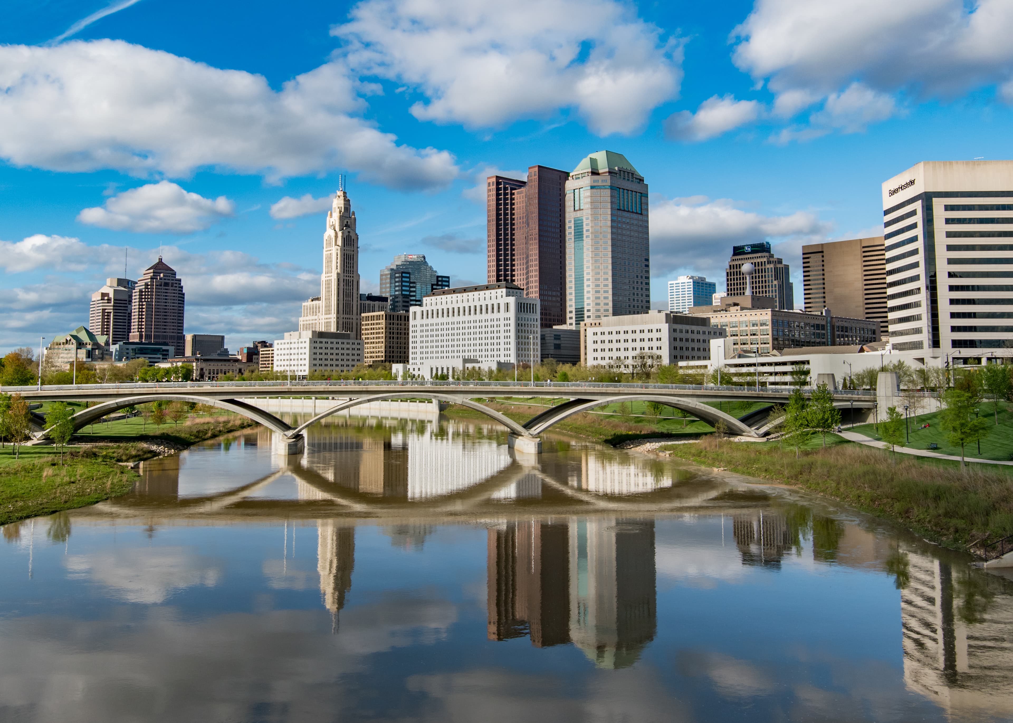 A bridge in Columbus with the city skyline in the background